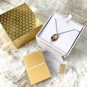 NWT authentic MK rosegold tone heart pendant